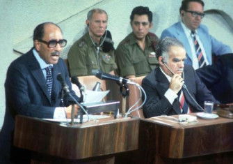 Egyptian president Anwar Sadat addresses the Israeli Knesset, 20 November 1977. National Library of Israel. Public Domain.