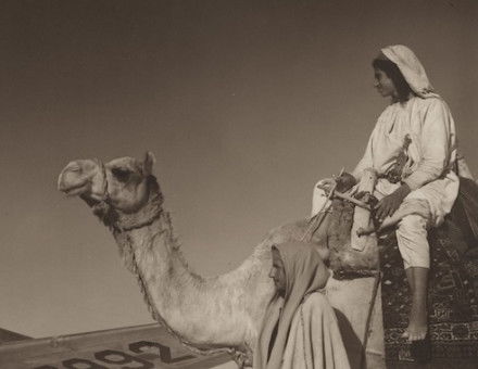 Arabian American Oil Co drilling rig in the desert, Saudi Arabia, by Robert Yarnall Richie, 1948. DeGolyer Library, Southern Methodist University. Public Domain.